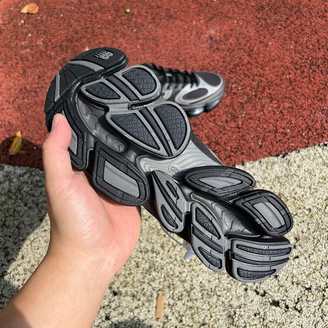 New Balance 1906R Black Grey with Translucent Segmented Sole