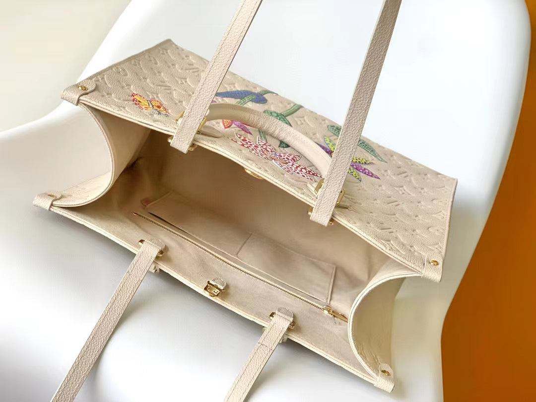 Louis Vuitton OnTheGo Monogram Empreinte Cream Leather Tote with Floral Embroidery