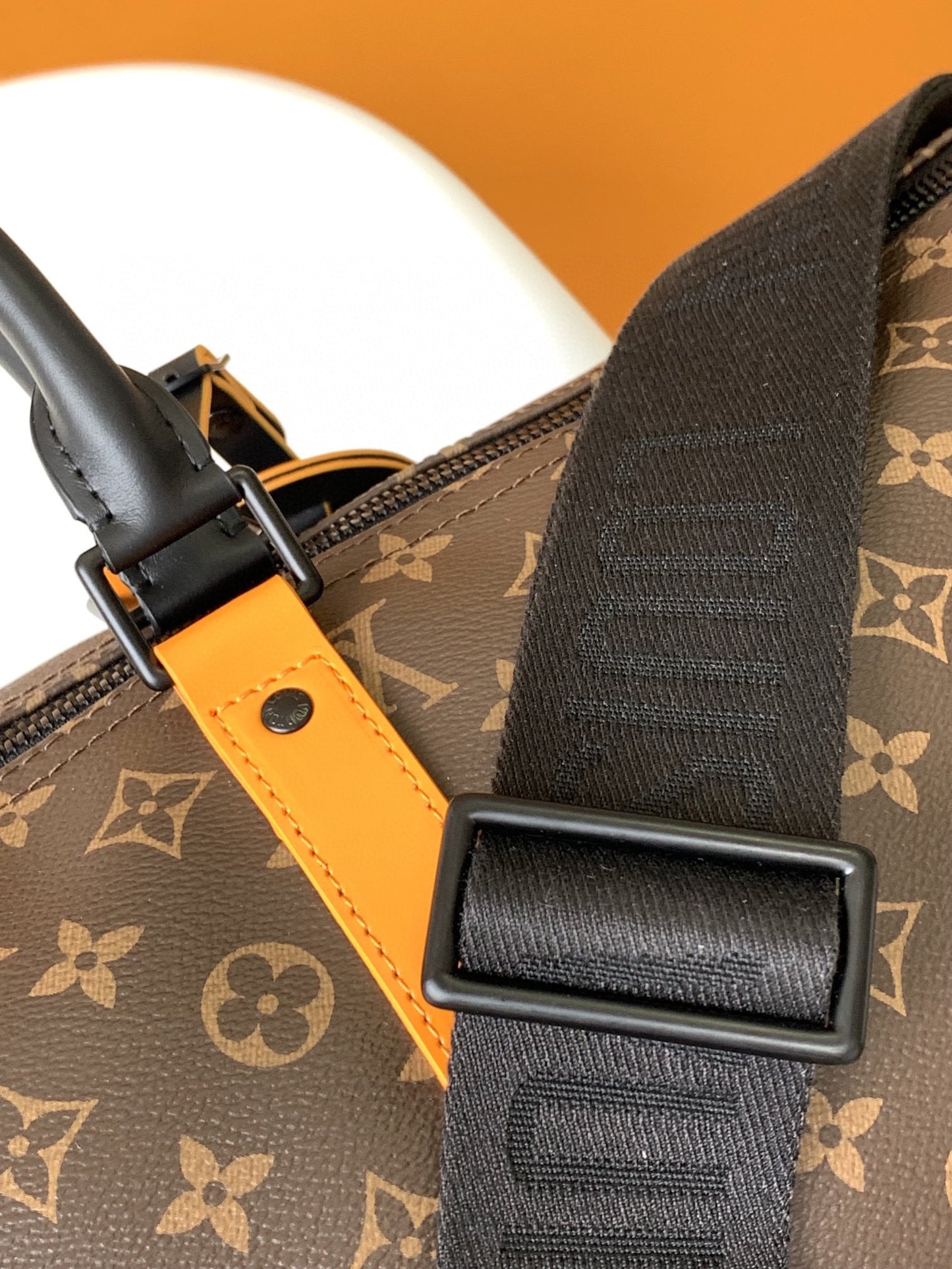 Louis Vuitton Keepall Bandoulière Monogram Canvas with Orange Trim Travel Bag