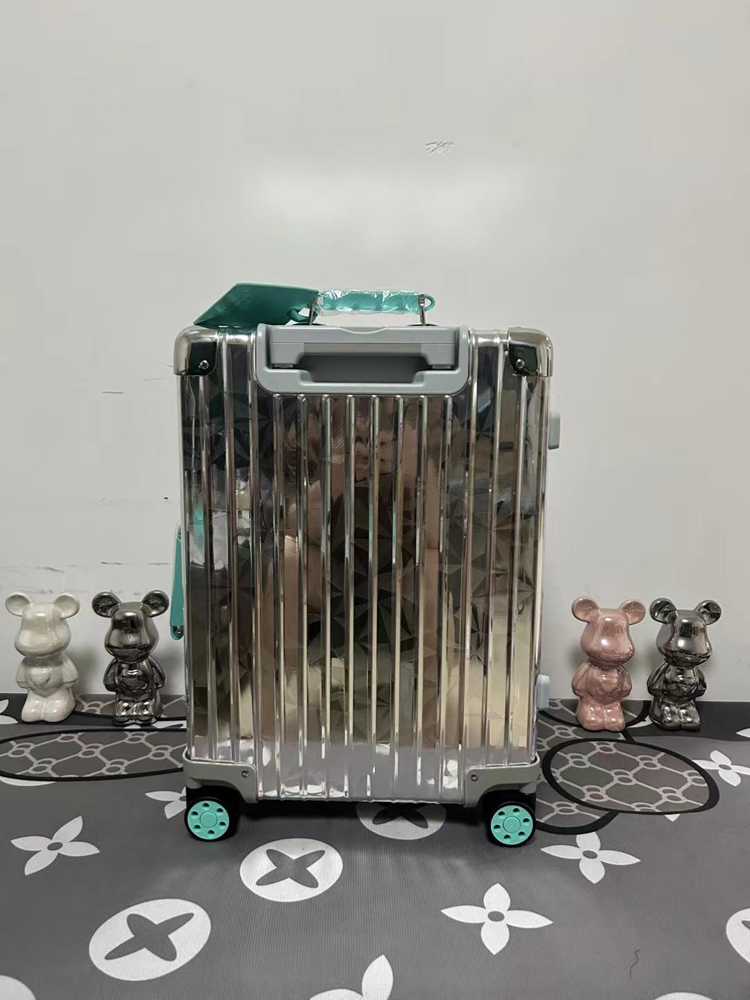 Metallic Silver Ribbed Hard Shell Carry-On Suitcase with Teal Accents