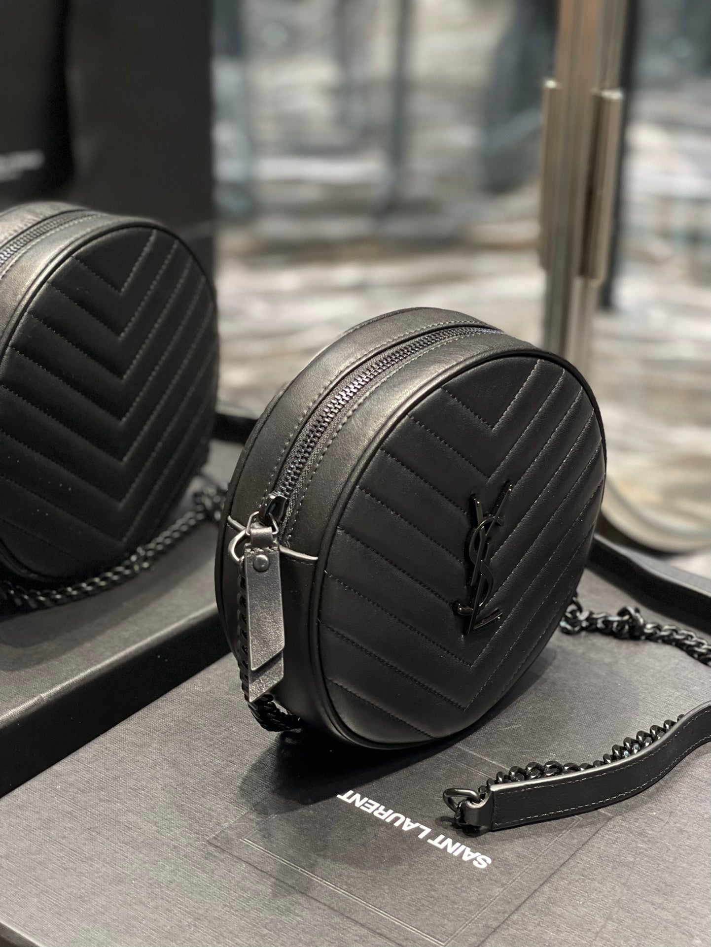 Saint Laurent Vinyle Round Camera Bag in Chevron-Quilted Leather - Black