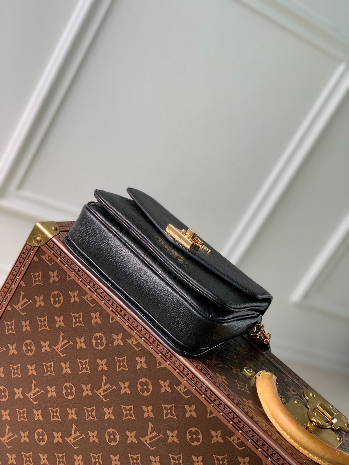 Elegant Black Crossbody Bag with Gold-Tone Hardware and Top Handle