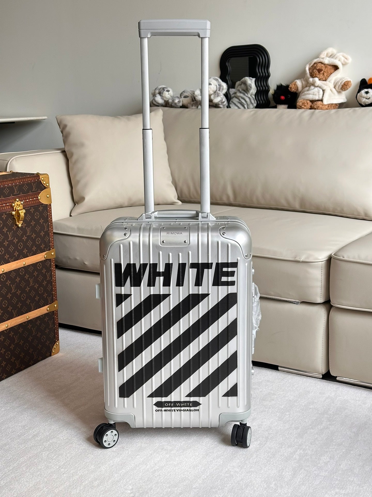 Silver Hardshell Carry-On Spinner Luggage with Black Diagonal Stripes