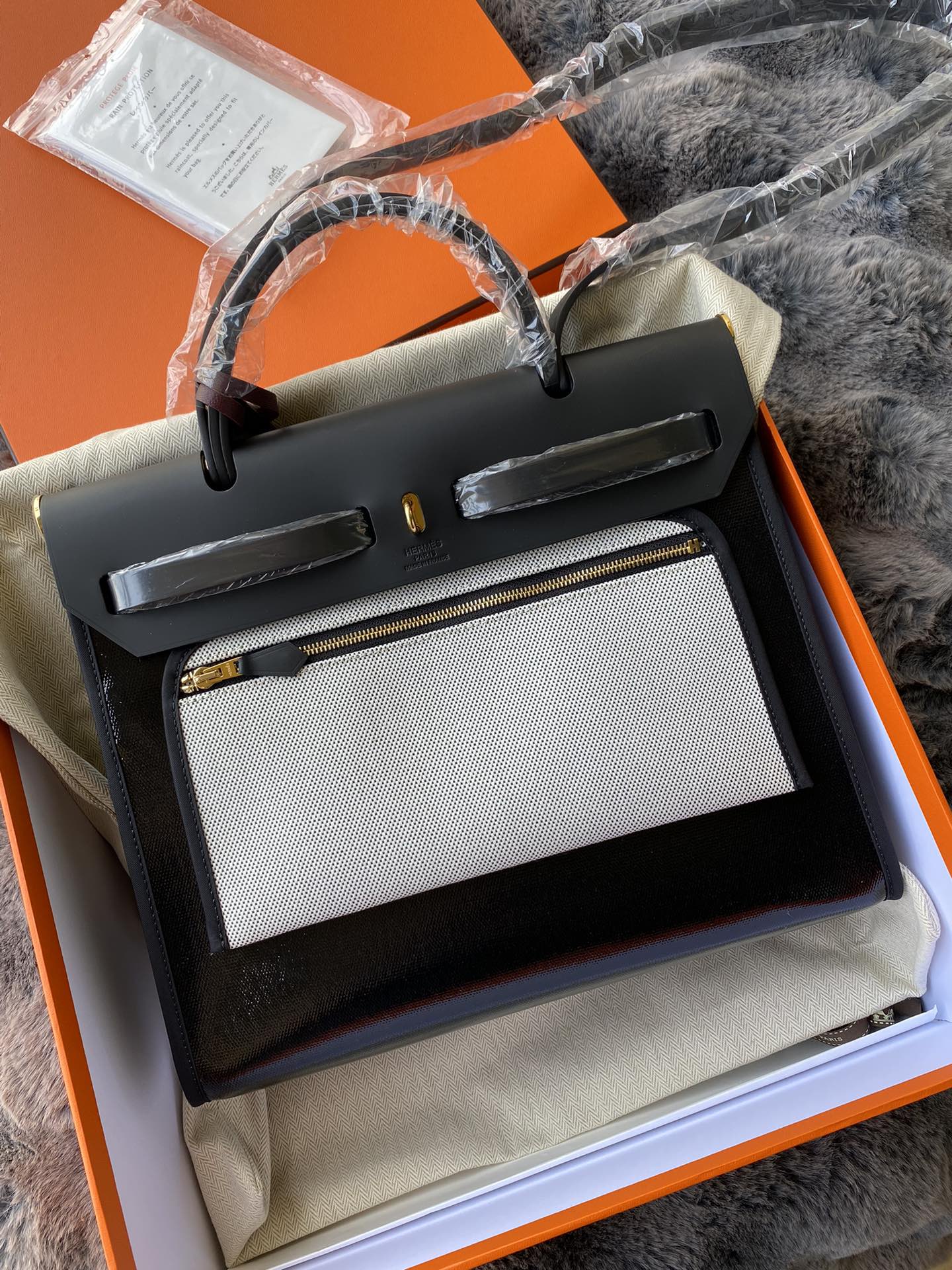 Classic Black Leather Top-Handle Handbag - Gold-Tone Hardware &amp; Geometric Charm Accessory