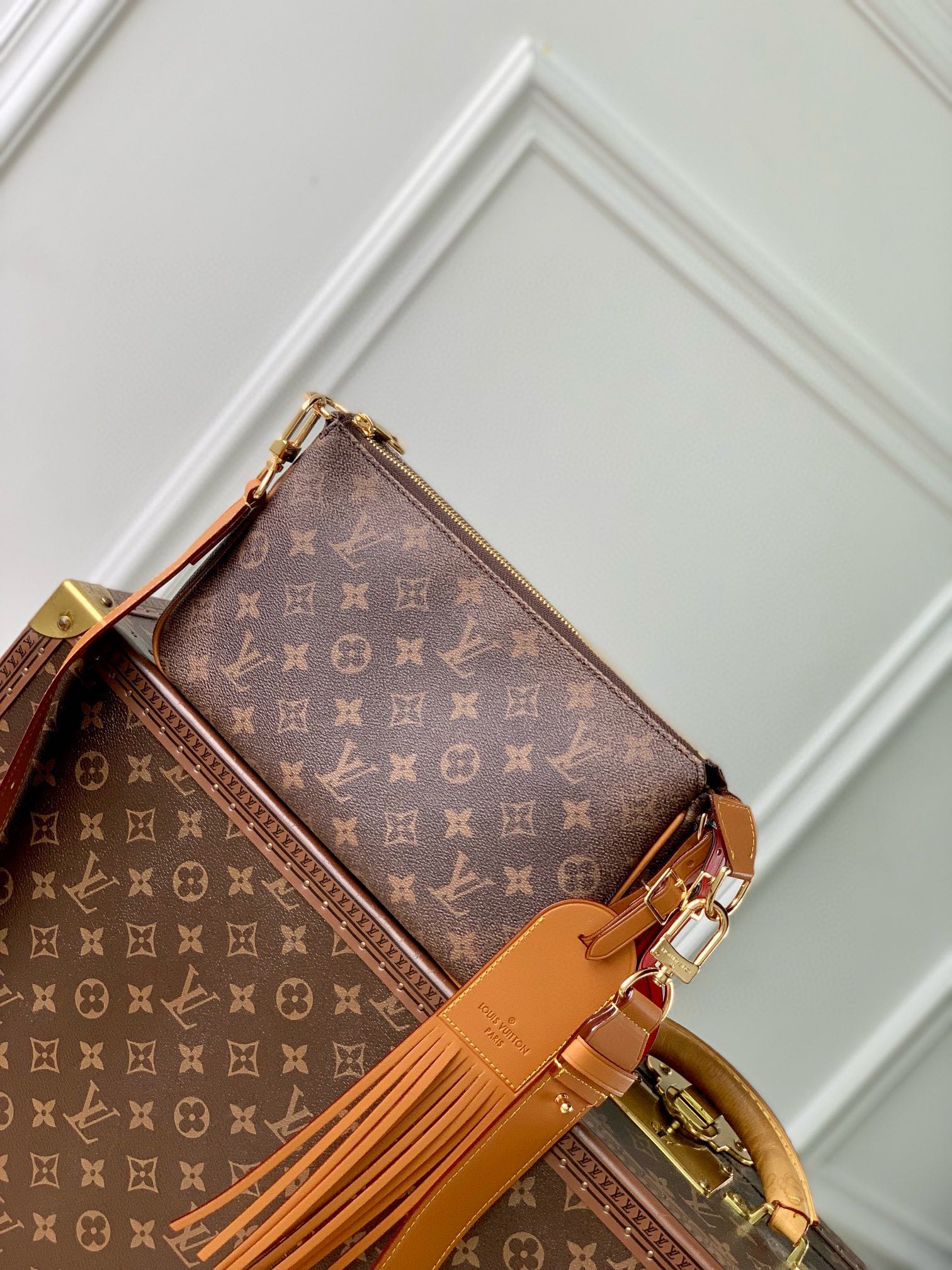 Luxury Monogram Brown Handbag with Tassel Detail - Elegant Designer Style Crossbody Bag